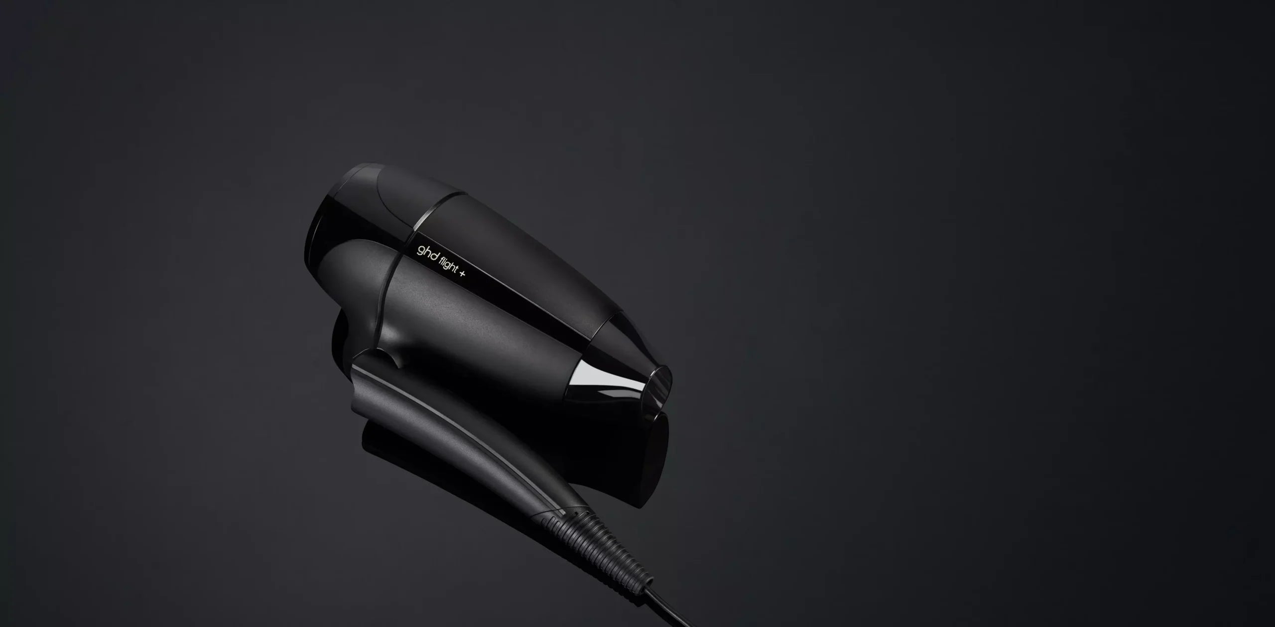 GHD Flight+ Resefön